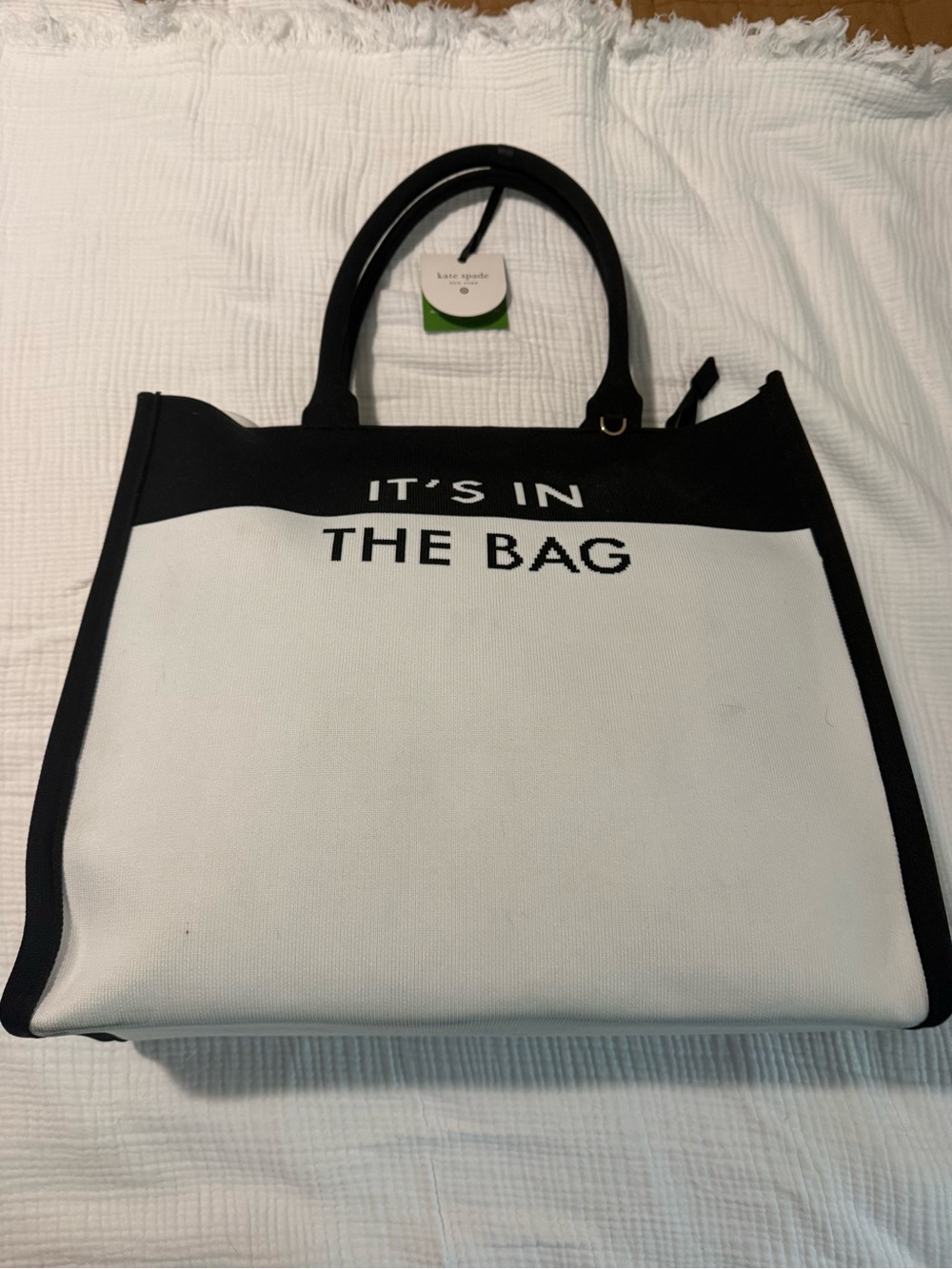 kate spade Black & White Canvas Tote with 'IT'S IN THE BAG' Script